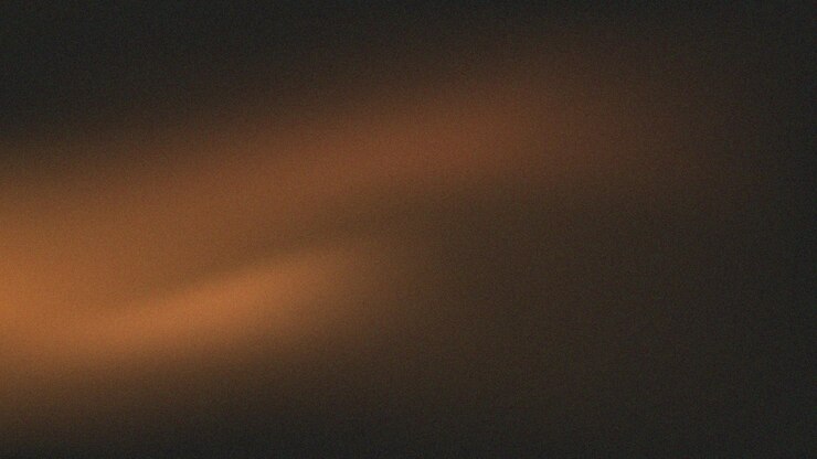 black orange light spot a normal simple grainy gradient abstract background