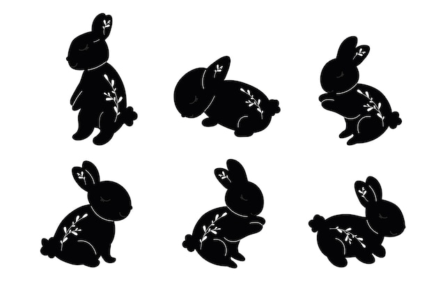 Vector black silhouette baby bunnies with leafs. little rabbit. cute easter animal. hares illustration