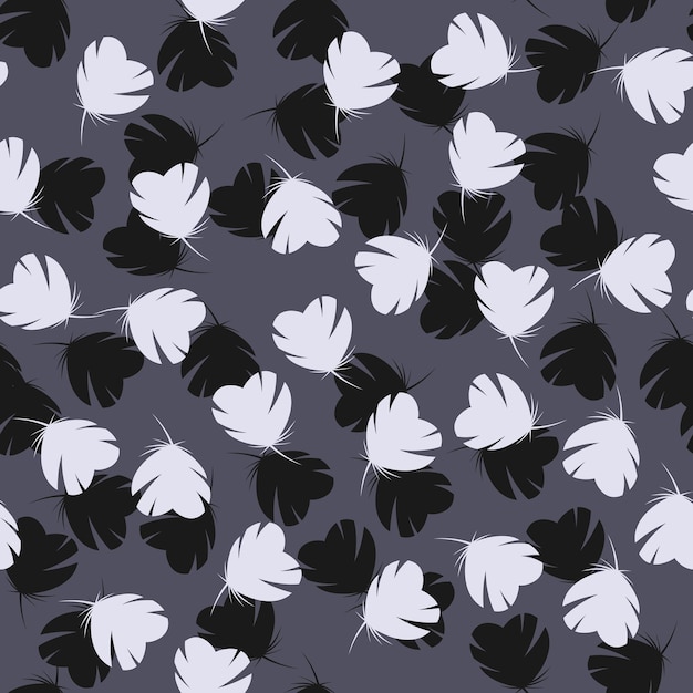 Black and white feathers on grey background. Vector seamless pattern.