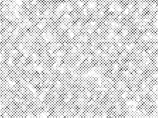 Black and white grunge background with a pattern of dots.