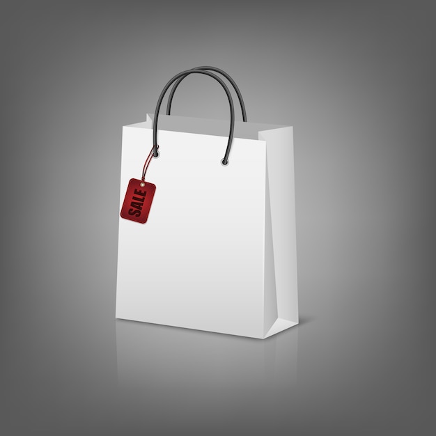 Vector blank paper shopping bags with sale tag.