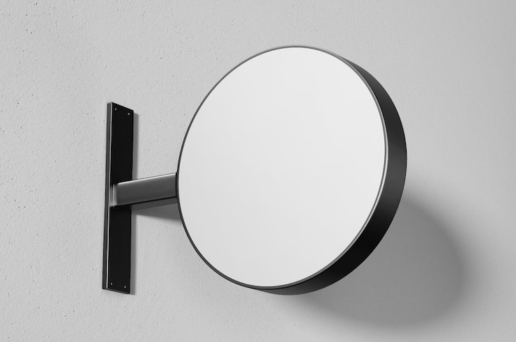Vector blank round sign board attached on wall of the building
