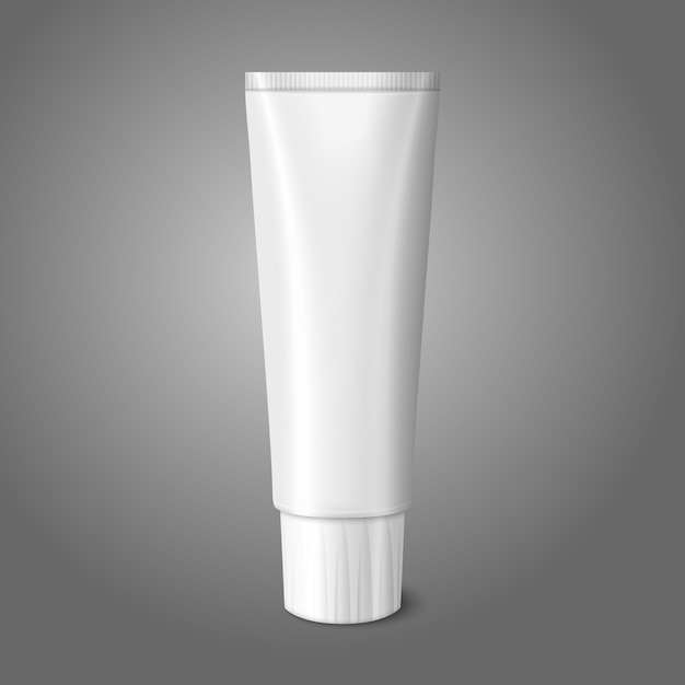 Blank white realistic tube for toothpaste, lotion, cosmetics, medicine creme etc.  on grey background with place for your  and branding.