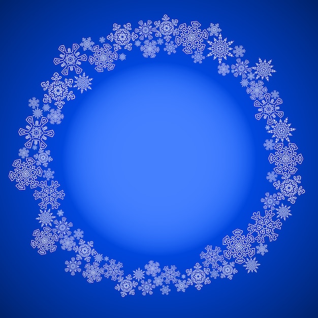 Vector blauw kerstmisframe met sneeuwvlokkencirkel