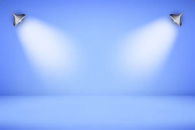 Blauwe kamer verlicht door twee schijnwerpers