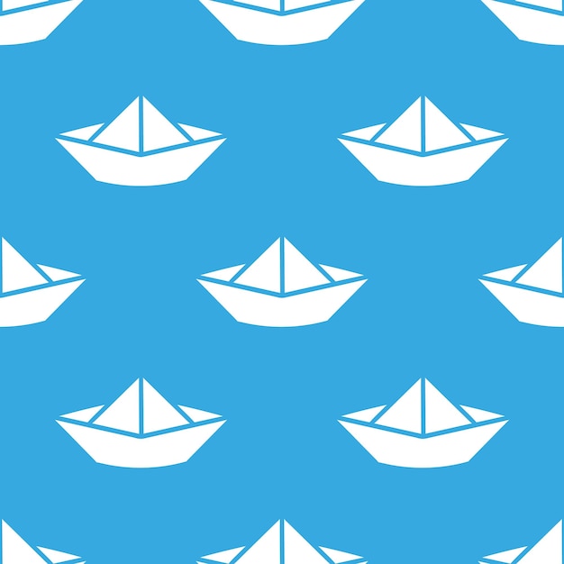 Blue seamless pattern with white paper boats