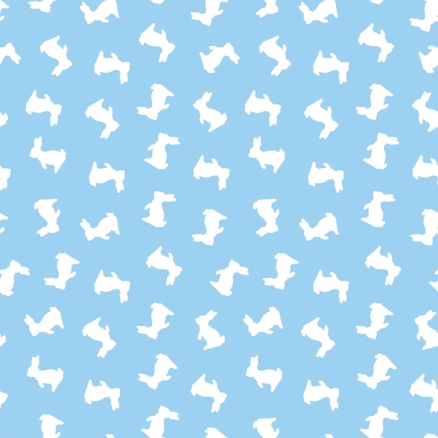 Blue seamless pattern with white rabbits