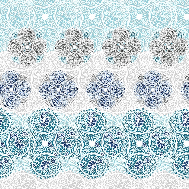 A blue and white pattern with a white flower on it.