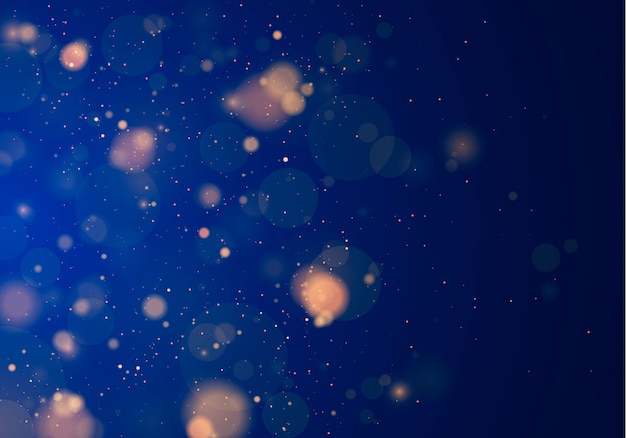 Blurred bokeh light on dark blue background.  and New Year holidays template. Abstract glitter defocused blinking stars and sparks.