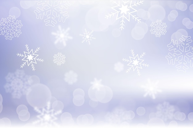 Vector blurred snowflakes in winter background