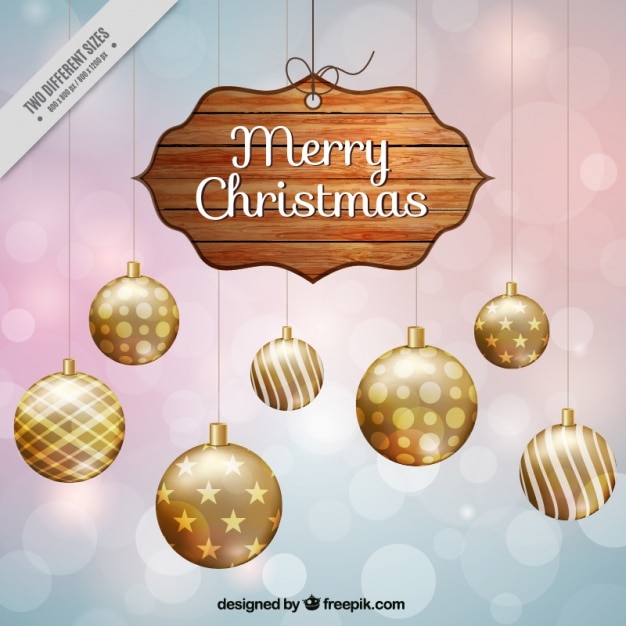 Bokeh background with christmas sign and golden baubles