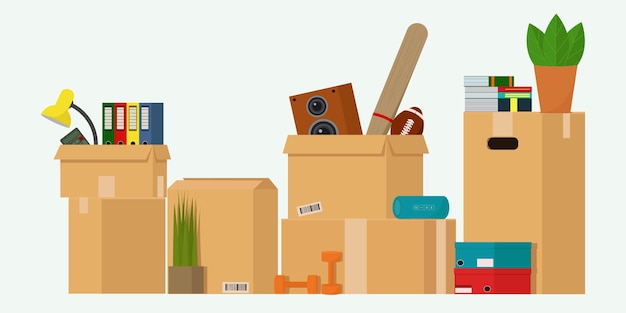 Scatole con oggetti per trasferirsi in una nuova casa scatole di cartone con oggetti