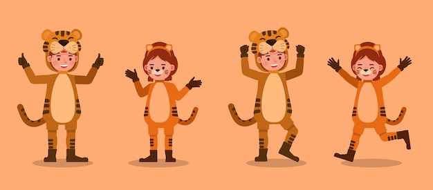 Мальчик и девочка в костюмах тигра. представление в различных действиях с эмоциями.