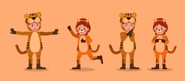 虎の衣装のキャラクターを着ている男の子と女の子。感情を込めた様々なアクションでのプレゼンテーション。