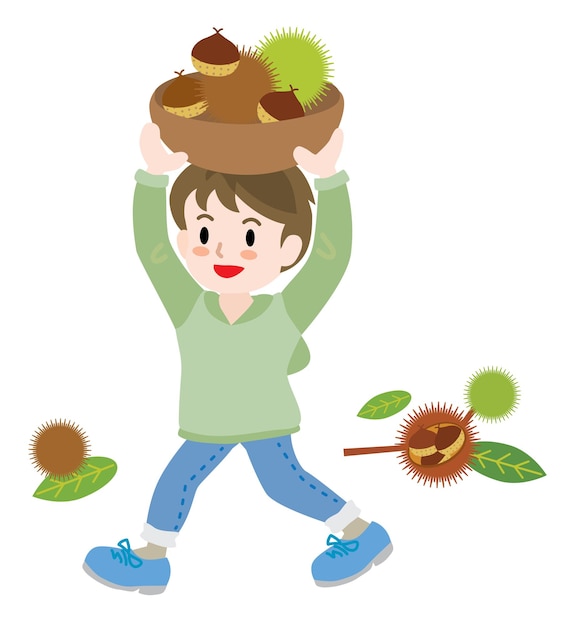 A boy gathering chestnuts in the autumn