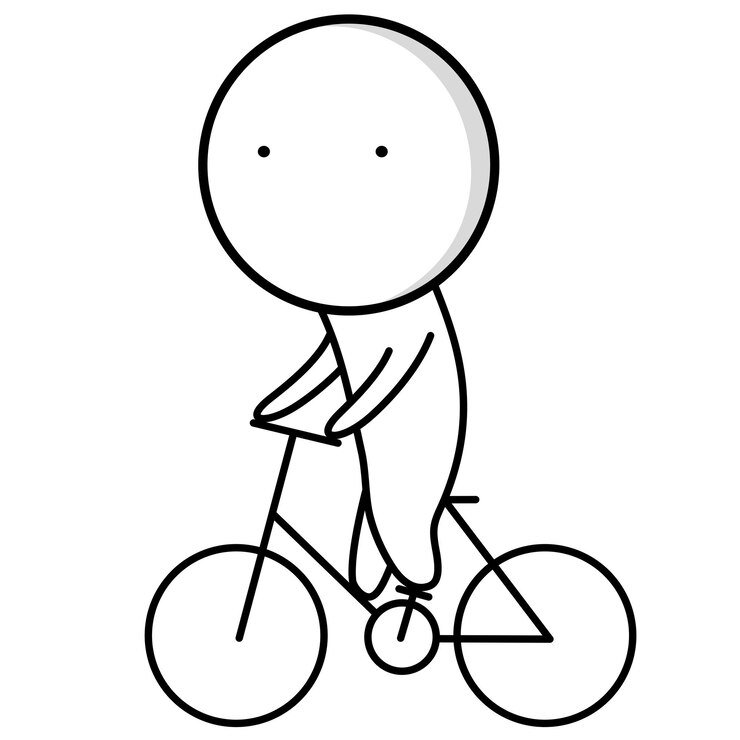 ヘルメットをかぶった少年が高速で自転車に乗る