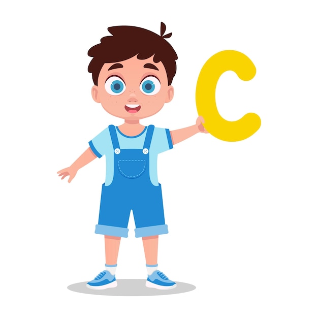 The boy holds the letter c in his hand