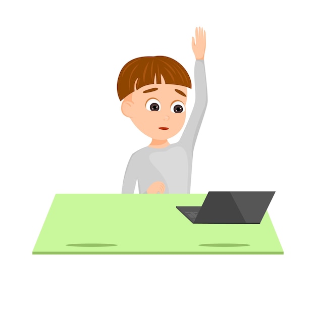 The boy is sitting at desk with laptop and raising his hand Homeschooling Concept Online studying