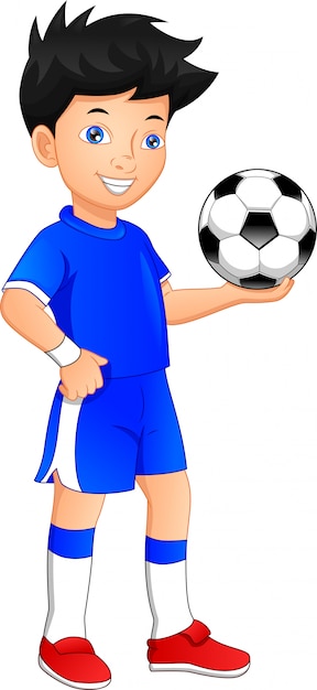 boy playing football. Boy holding ball