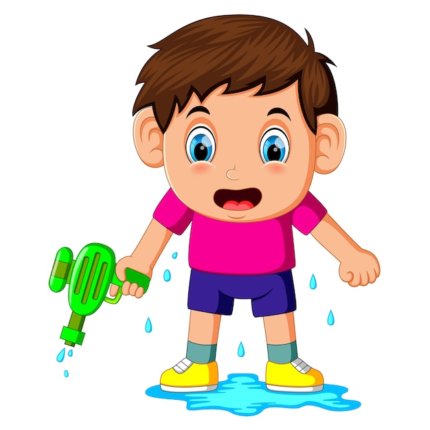 Boy playing with water gun