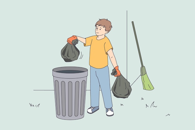 Мальчик наводит порядок и выбрасывает мешки с мусором в мусорное ведро