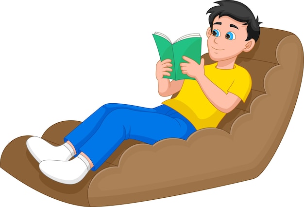 boy reading a book on the sofa