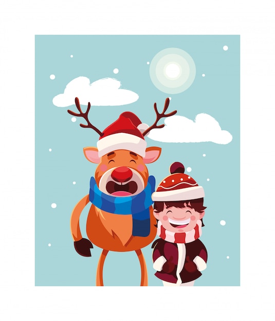 Boy and reindeer with hat and scarf in winter landscape