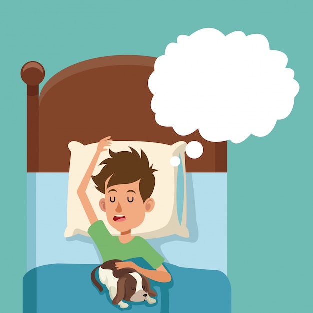 Il sogno di sonno del ragazzo con il cane a letto