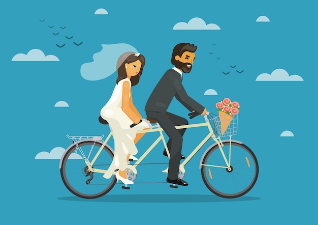 Bride and groom together riding tandem bike with heart balloons in the sky Wedding concept