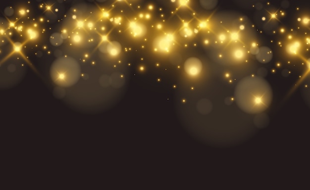 Bright beautiful golden sparks on a transparent background.