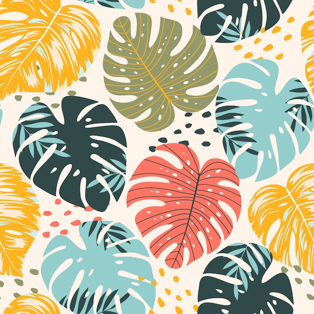 Bright tropical seamless background with large leaves