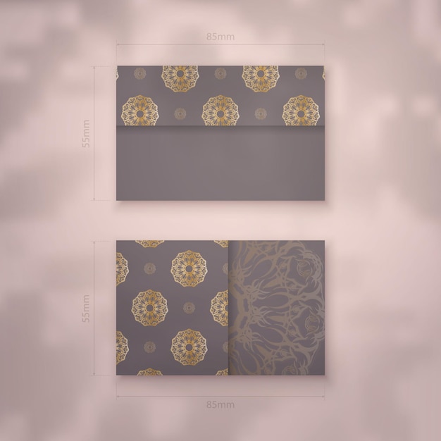 Bruin visitekaartje met Grieks gouden patroon voor uw merk.