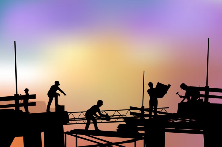Vector builders silhouette at sunset