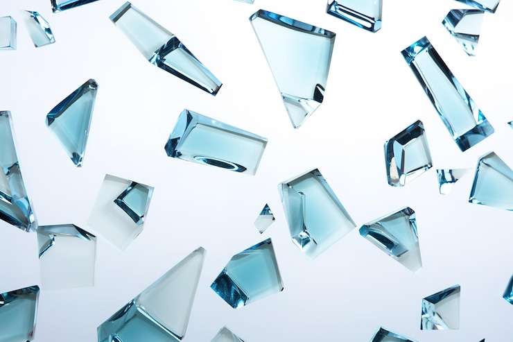 Vector a bunch of broken glass pieces are scattered on a white background