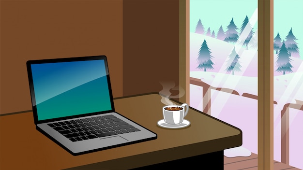 Bureau met laptop en koffie naast de natuur winter landschapsmening