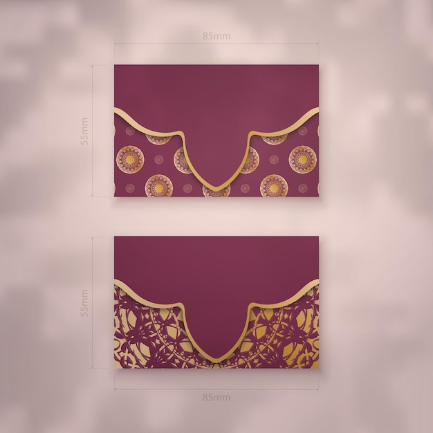 Burgundy business card template with Indian gold ornaments for your personality.