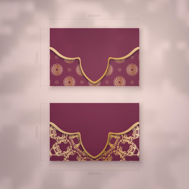 Burgundy business card template with vintage gold ornaments for your business.