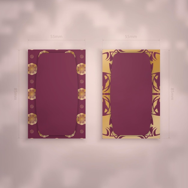 Burgundy business card with Greek gold pattern for your personality.