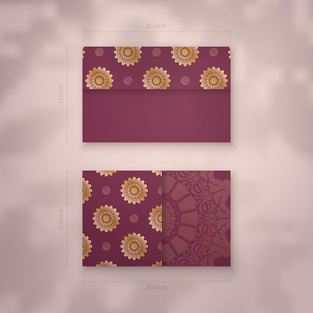 Burgundy business card with vintage gold ornaments for your business