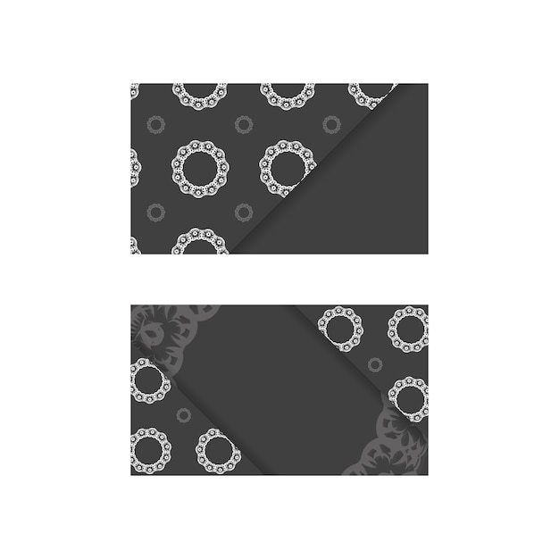 business card in black with luxurious white ornaments for your personality