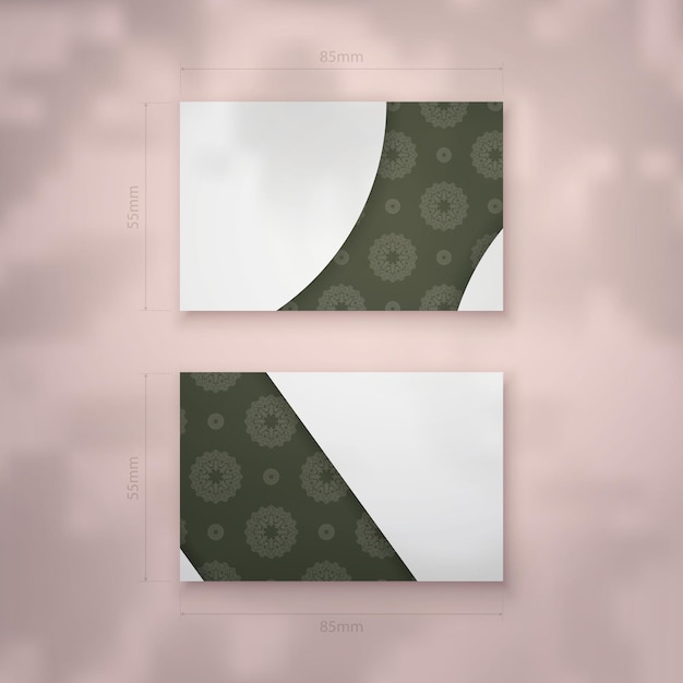 Vector business card in dark green color with luxurious white pattern for your business.