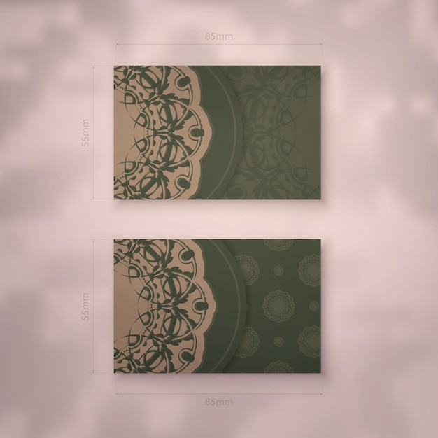 Business card in green with abstract brown ornament for your brand.