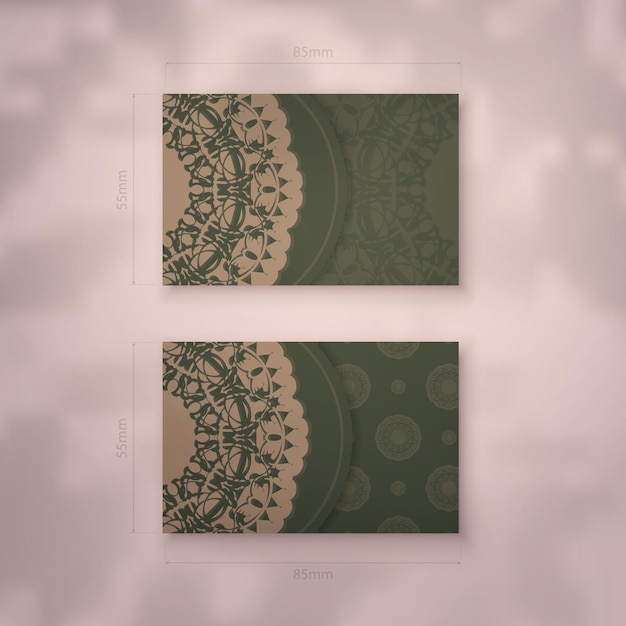 Business card in green with Indian brown ornaments for your brand.