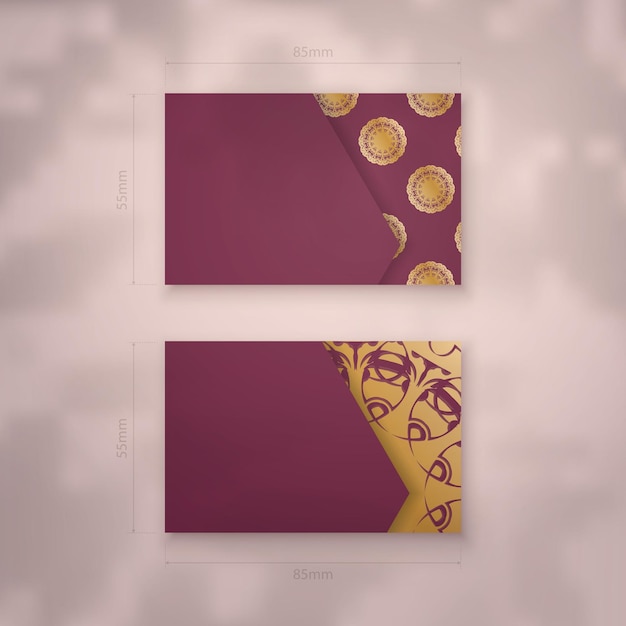 Business card template in burgundy color with abstract gold ornament for your contacts.