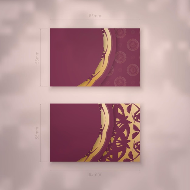 Business card template in burgundy color with Greek gold ornaments for your contacts.