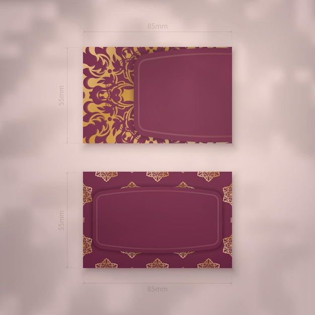 Business card template in burgundy color with greek gold pattern for your contacts.