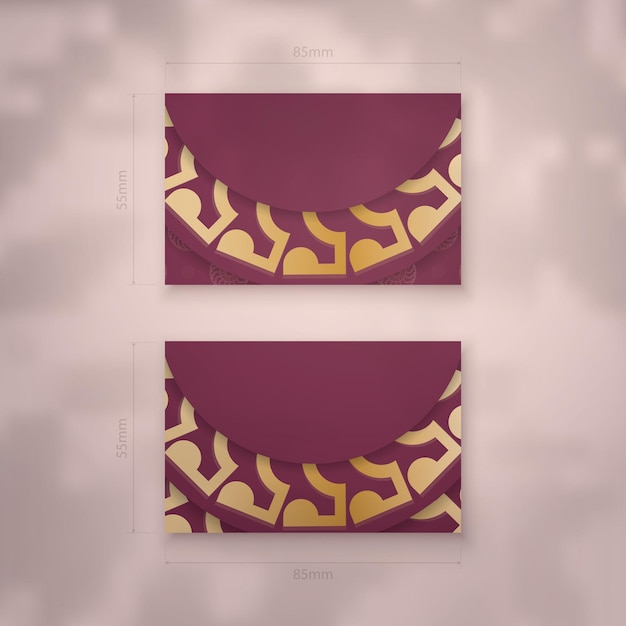 Business card template in burgundy color with vintage gold ornaments for your brand.