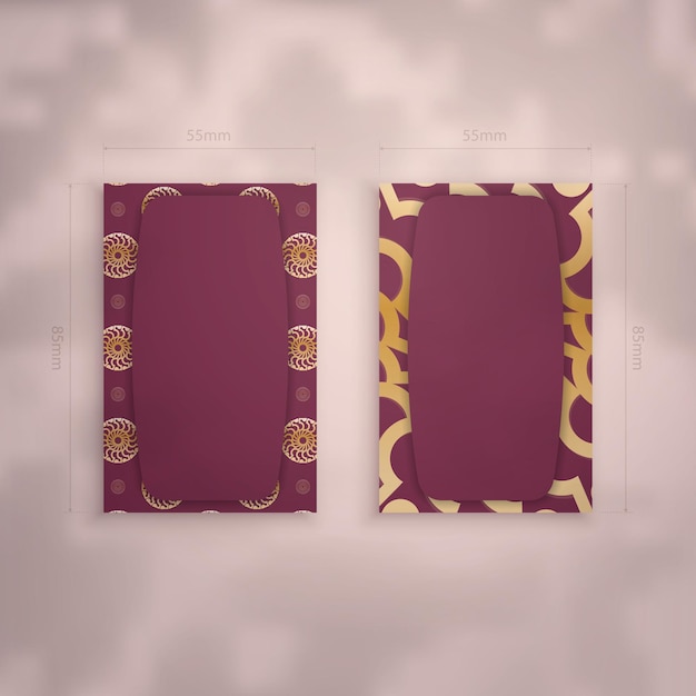 Vector business card template in burgundy color with vintage gold ornaments for your personality.
