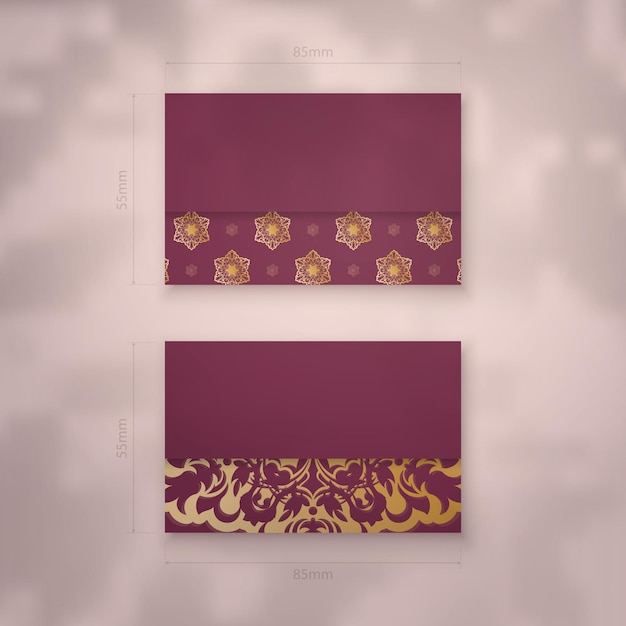 Business card template in burgundy color with vintage gold pattern for your personality.