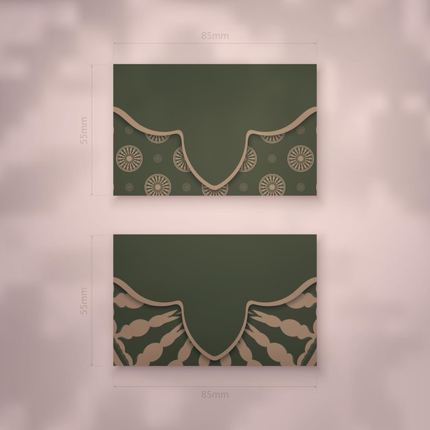 Business card template in green color with indian brown ornaments for your business.